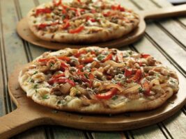 Receta Pizzas vegetarianas con cebolla caramelizada, pimiento y queso azul